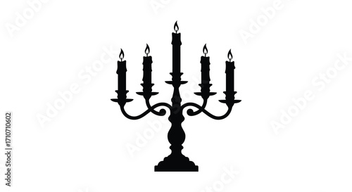 Elegant black silhouette of a five branch candelabra with lit candles