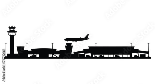 Silhouetted airport scene featuring a control tower and departing airplane