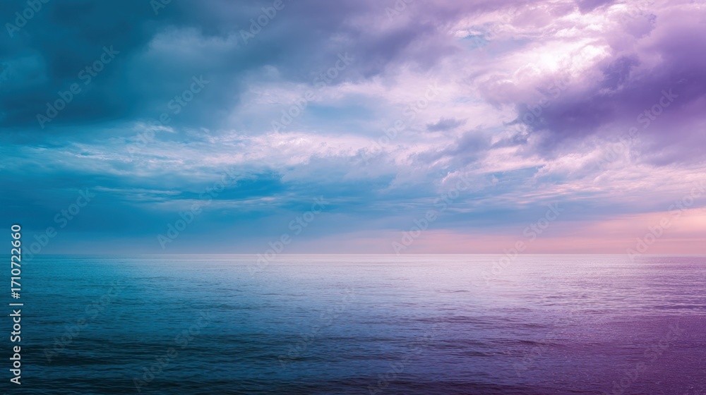 Obraz premium Tranquil ocean sunset sky