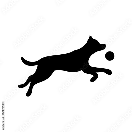A playful dog silhouette joyfully leaping towards a ball with enthusiasm