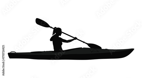 Silhouette of a woman kayaking on calm waters graceful and serene