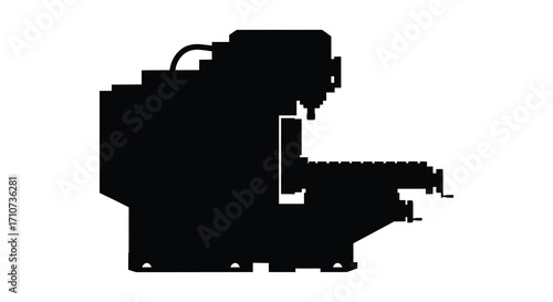 Silhouetted industrial robotic arm performing automated tasks in a factory setting