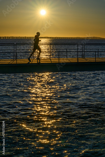 A man running early in the morning in Lisbon