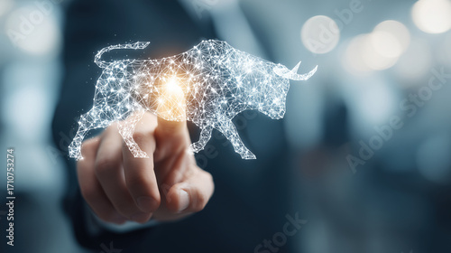 Businessman touching virtual screen with white bull and stock market icon, financial growth concept in office background