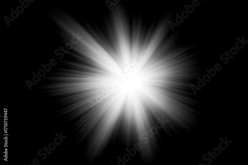 Bright white starburst effect with radial light rays on black background