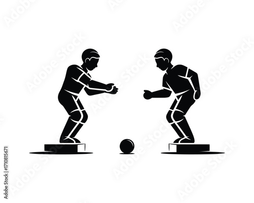 Silhouette of two foosball players in action with a ball