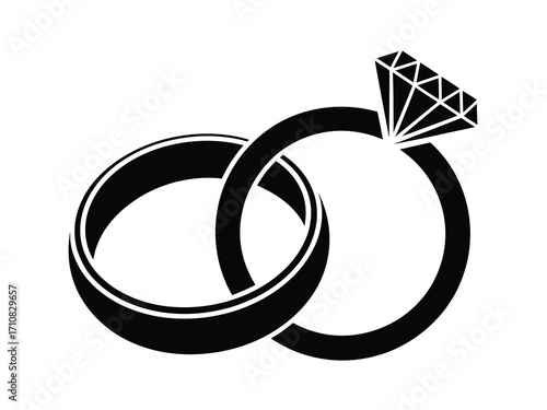 Intertwined wedding rings with diamond engagement ring