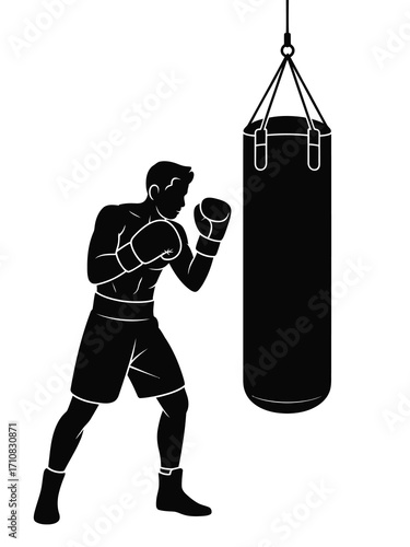 Silhouette of a boxer training with a punching bag
