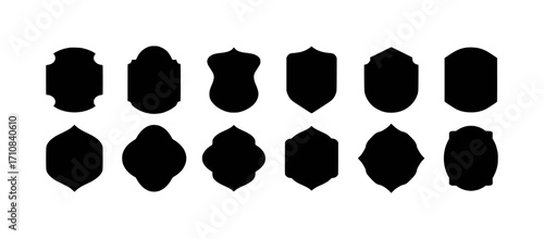Collection of Black Shield and Emblem Shapes on White Background