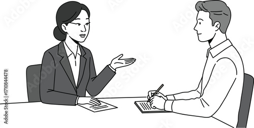 Two people are having a conversation at a table