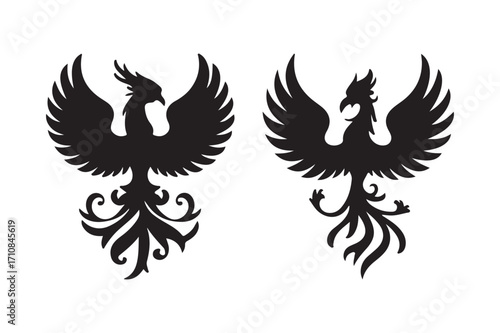 Two black silhouette phoenix birds facing each other