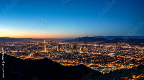 Stunning aerial timelapse of Phoenix Arizona skyline at dusk with vibrant city lights