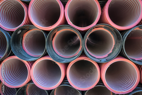 stack of drain waters hoses on a construction site