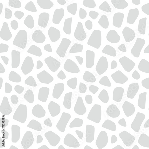 Abstract seamless pattern resembling animal skin and castle wall texture. Light gray organic shapes on white background creating scrim effect. Neutral repeated design for interior, textile, wallpaper