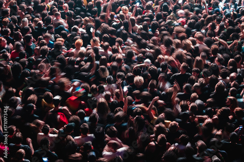 Aerial view of concert crowd mosh pit motion