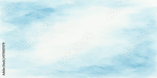 A beautiful blue sky with fluffy white clouds drifts by on a bright summer day