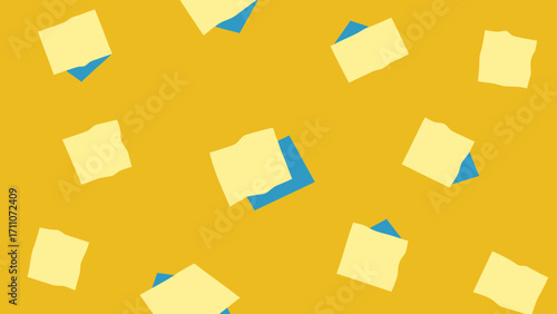 A single blank yellow sticky note is posted on a wall, a simple reminder for office business