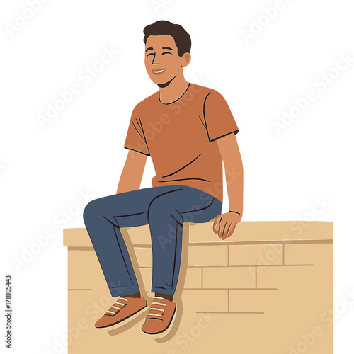 A young man smiles as he sits on a wall beneath a clear sky