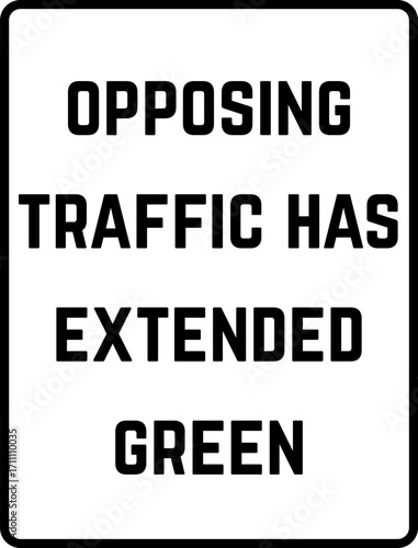 opposing traffic has extended green sign