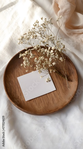 Wallpaper Mural Rustic wooden plate holding a sprig of dried babys breath and a blank white card. Torontodigital.ca