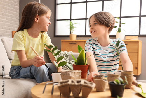 Cute children taking care o...