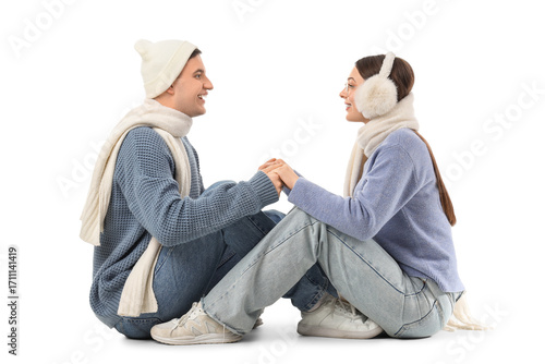 Cute young couple in warm s...