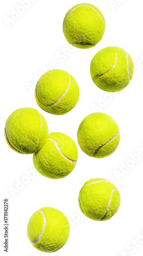 A collection of bright yellow tennis balls falling down.