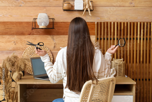 Female inventor with scisso...