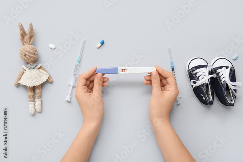 Female hands with pregnancy...