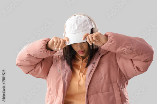 Young woman in stylish puff...