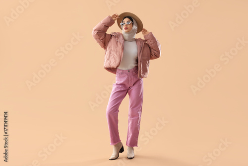 Fashionable young woman in ...