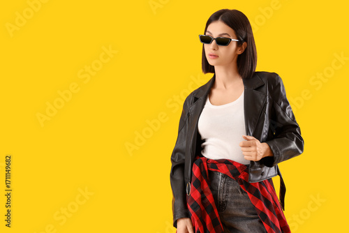 Young woman in stylish leat...