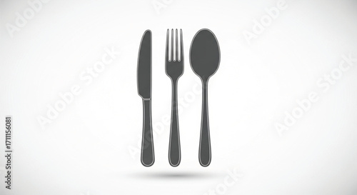 Simple flatware set: knife, fork, and spoon arranged neatly on a white background.