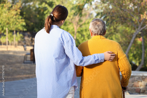 Caregiver with senior woman...