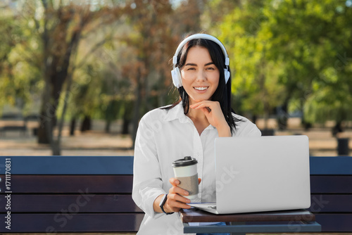 Young woman with coffee and...