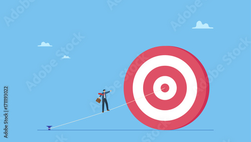 Businessman walking on the line aiming at target bullseye. Set goal and take action to achieve goal or target, aiming or motivation to grow business and success, effort or skill to reach goal.