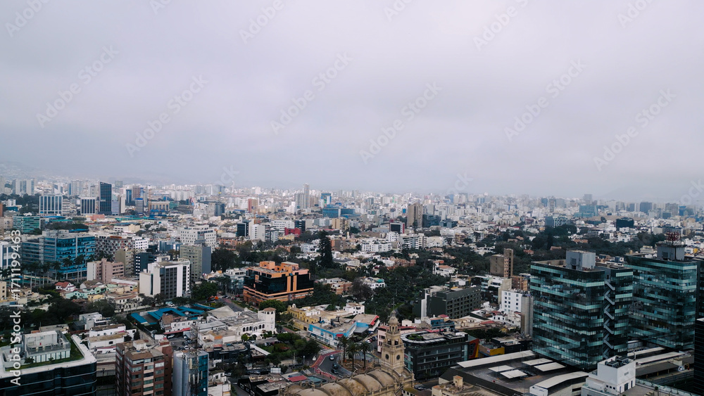 Obraz premium Aerial view of San Isidro financial district in Lima, Peru on a cloudy September day.