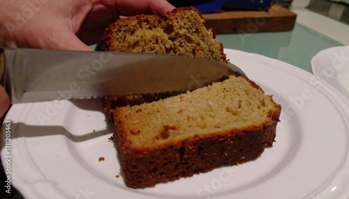 Slicing a loaf of homemade bread