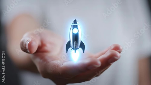 Hand Holding a Futuristic Rocket Model with Glowing Effects