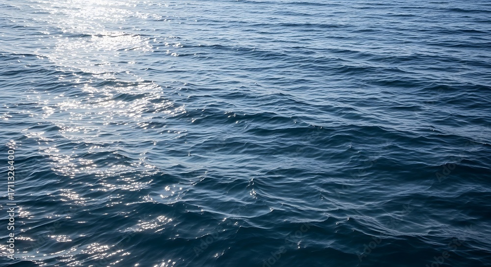 Naklejka premium Azure expanse Sunlight dances on serene water's surface, creating shimmering reflections and tranquil ripples