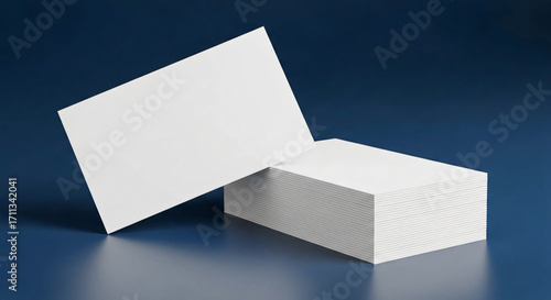 Blank Business Cards Stacked on Blue Surface