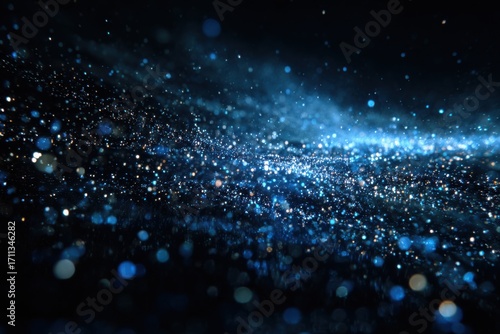 Stunning Blue Glittering Particles in a Dark Space, Captivating Light Effects, Abstract Cosmic Background