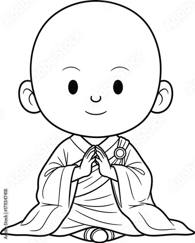Peaceful young monk in traditional robes sits in meditation with hands clasped