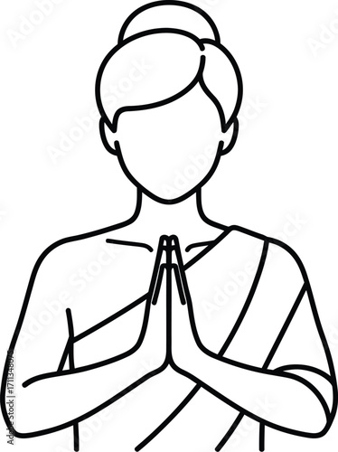 Person with hands pressed together in a gesture of welcome or greeting.