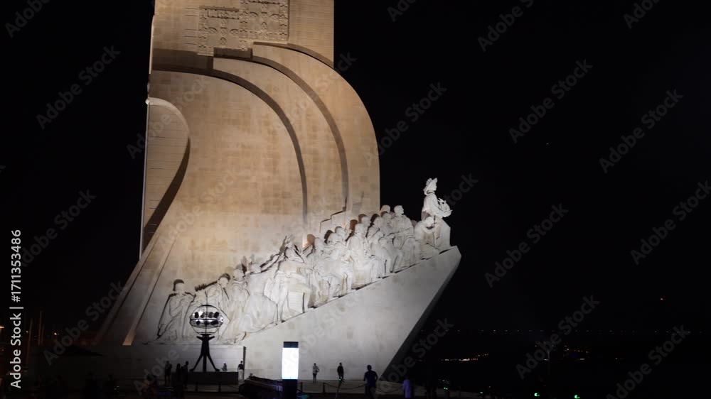 illuminated Monument to the Discoveries or Padrao dos Descobrimentos at the bank of Tagus River at Belem district at night.