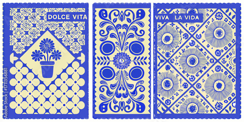 Three vibrant blue and yellow papel picado banners with floral and abstract designs and text