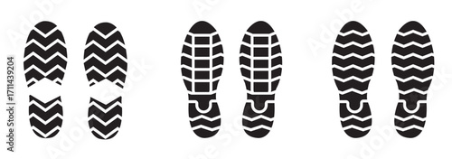 Different human footprints. Imprint soles shoes. Baby children footprint, Shoes for children and adults, adults and children's steps. Perfect for ecology, environment, travel, identity, lifestyle. 