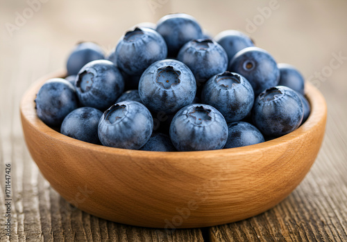 Wallpaper Mural Fresh Blueberries in Wooden Bowl on Rustic Table as Rich Natural Source of Antioxidants Torontodigital.ca