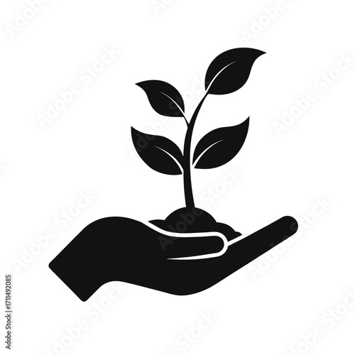 A human hand cradling a new sprout from the soil, symbolizing the concept of nature's growth and environmental life
