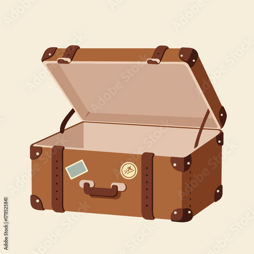 Open brown vintage suitcase with leather straps and metal corner protectors
